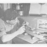 Алликсоо Пауль помощник мастера по ловле сельди делает модель корабля.  1961